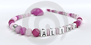 A pink pacifier chain for girls with name Alina