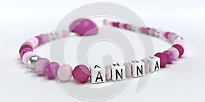 A pink pacifier chain for girls with name Anna