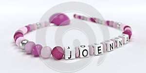 A pink pacifier chain for girls with name Joenna