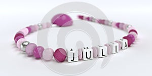 A pink pacifier chain for girls with name Julia