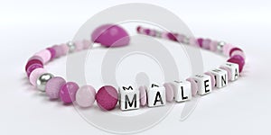 A pink pacifier chain for girls with name Malena