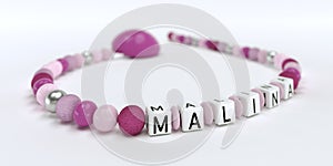 A pink pacifier chain for girls with name Malina