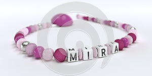 A pink pacifier chain for girls with name Mira