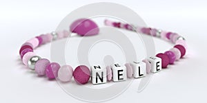 A pink pacifier chain for girls with name Nele