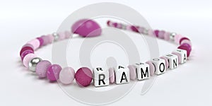 A pink pacifier chain for girls with name Ramona