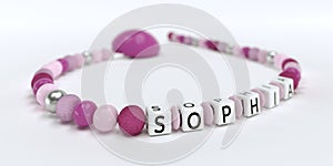 A pink pacifier chain for girls with name Sophia