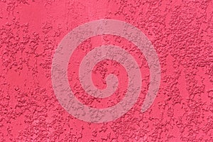 Pink paint rough plaster wall surface solid abstract stucco pattern background texture cement concrete