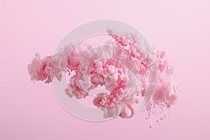 Pink paint splash in water isolated