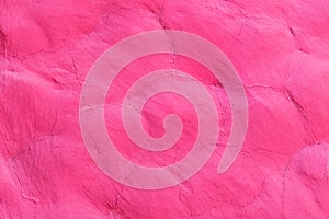 Pink paint on the stone surface wall texture abstract background pattern design