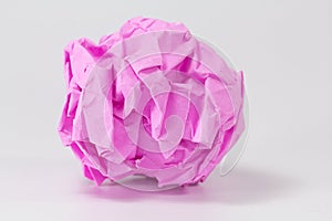 Pink paper balls on gray background