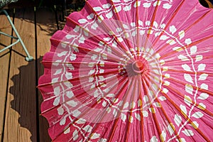Pink paper parasol
