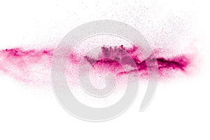 Pink particles splatter on white background. Pink powder exploding