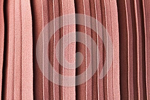 Pink pastel colour abstract texture background of pleat or gather a fabric in folds cloth