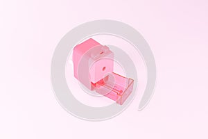 Pink pencil sharpener on natural background