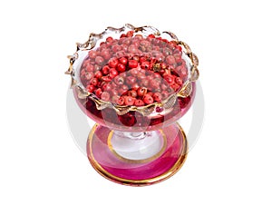 Pink pepper on wintage glass bowl. isolated