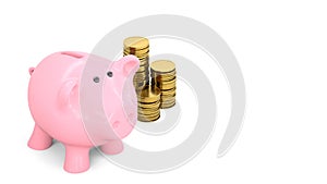 Pink piggy bank with gold coins