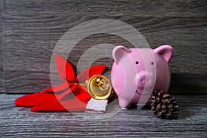 Pink piggy bank with X`mas themes, organize a party for the event where successful in saving money for use in various festivals