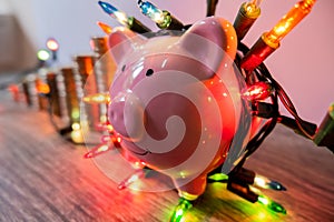 Pink piggy bank with party light, organize a party for the event where successful in saving money for use in various festivals