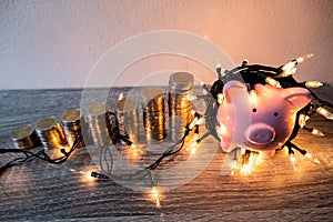 Pink piggy bank with party light, organize a party for the event where successful in saving money for use in various festivals