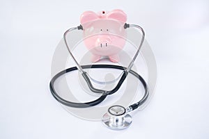 Pink Piggy Bank with Stethoscope