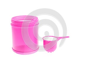 Pink plastic bottle of detergent