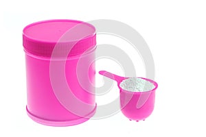 Pink plastic bottle of detergent