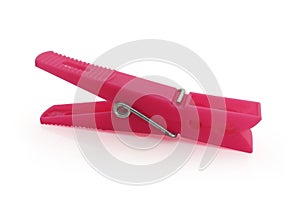 Pink plastic clothespin isolated on white background.