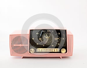 Pink Plastic AM Radio on White