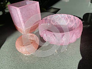 Pink plastic resin containers