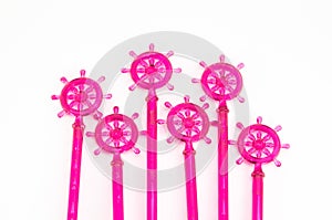 Pink plastic stir stick