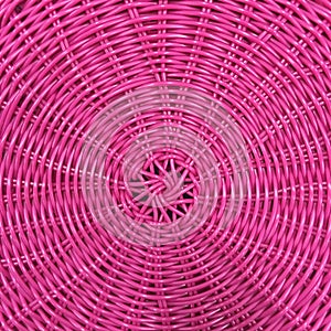 Pink plastic woven basket texture