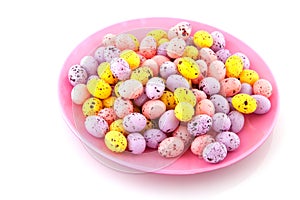Pink plate filled with easter eggs
