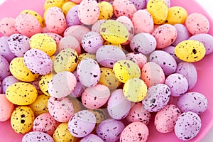 Pink plate filled with easter eggs