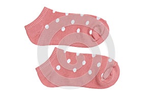 Pink polka dot ankle socks on white background, isolated