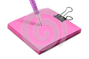 Pink post note pad with clip and pink pen