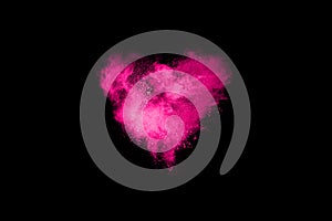 Pink powder explosion on black background.