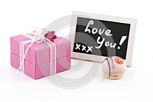 Pink present and a chalckboard