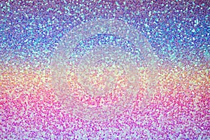 Pink purple and blue glitter texture, shiny sequins abstract background with blur. Party baby blur glitter texture