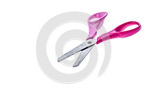 Pink and purple children scissors with plastic handles and blade