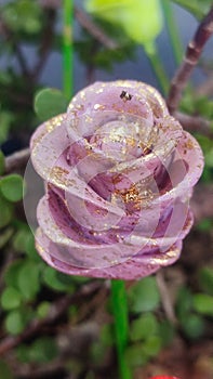 Pink purple flowers, artificial roses art object bouquet interior