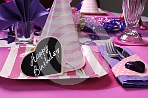 Pink and purple theme party table setting decorations