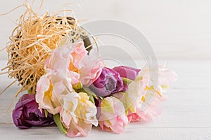 Pink purple tulips in tin bucket