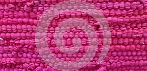 Pink ragg rug background texture