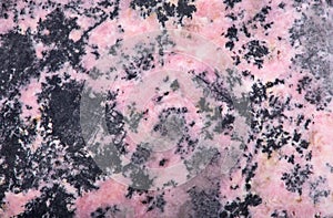 Pink rhodonite mineral texture photo