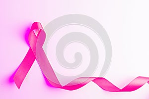 Pink ribbon banner. Health care symbol pink ribbon on white background. Breast cancer woman support with copy space.