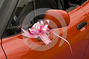 Pink ribbon on car