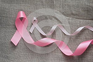 Pink ribbon. Symbol of breast cancer awareness. Health care conception. Preventive measures. October checking time.
