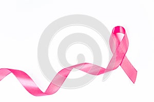 Pink ribbon on white background. Breast Cancer Awareness Month. Womens health care concept. Symbol of hope and support.