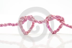 Pink rope heart shaped symbol