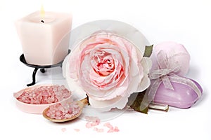 Pink rose with bath salt and candle